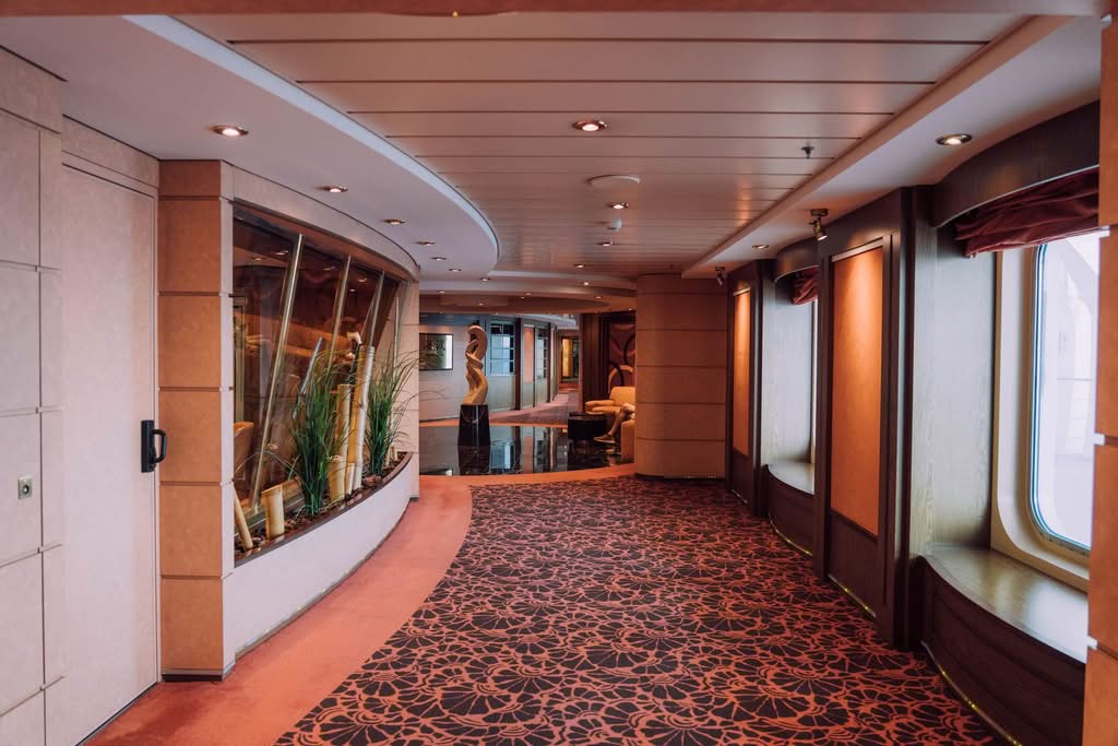 Elegant empty corridor interior of a luxury cruise ship with stylish design