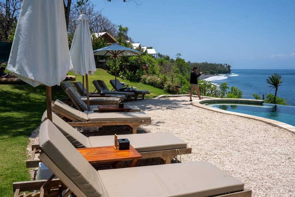 Relax by the pool with stunning ocean views at a Bali resort