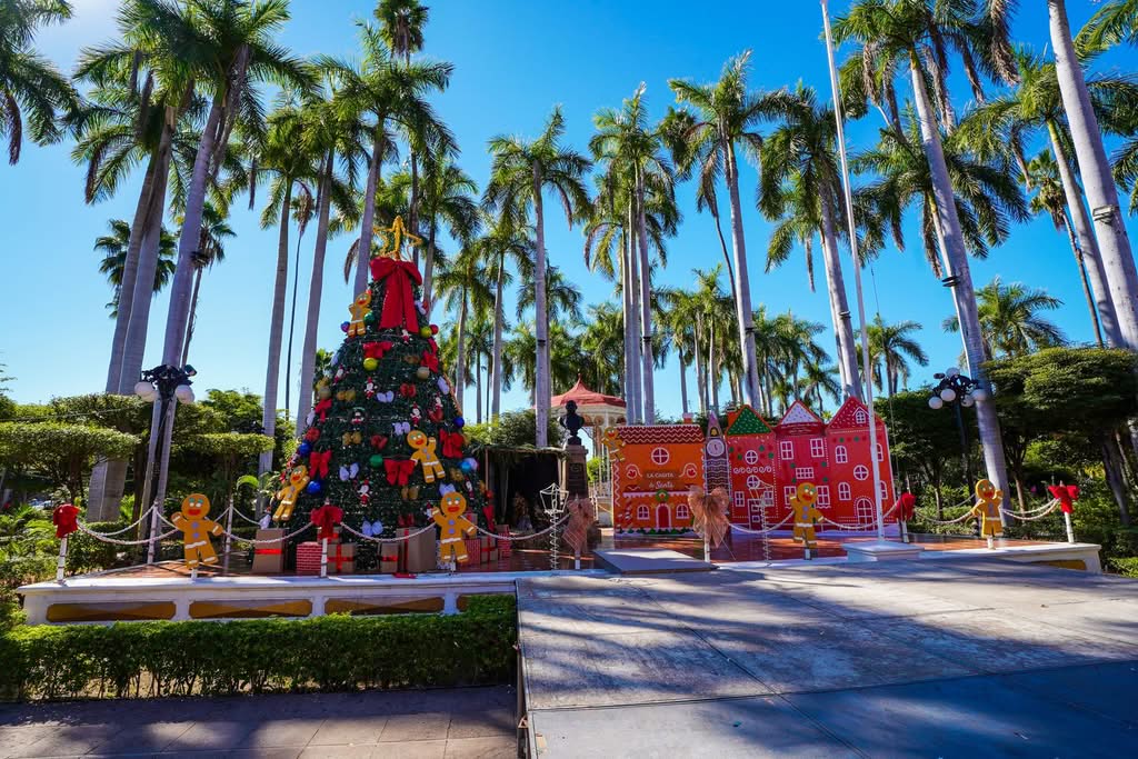 Gingerbread-themed Christmas display with palm trees in Topolobampo, Sinaloa, Mexico